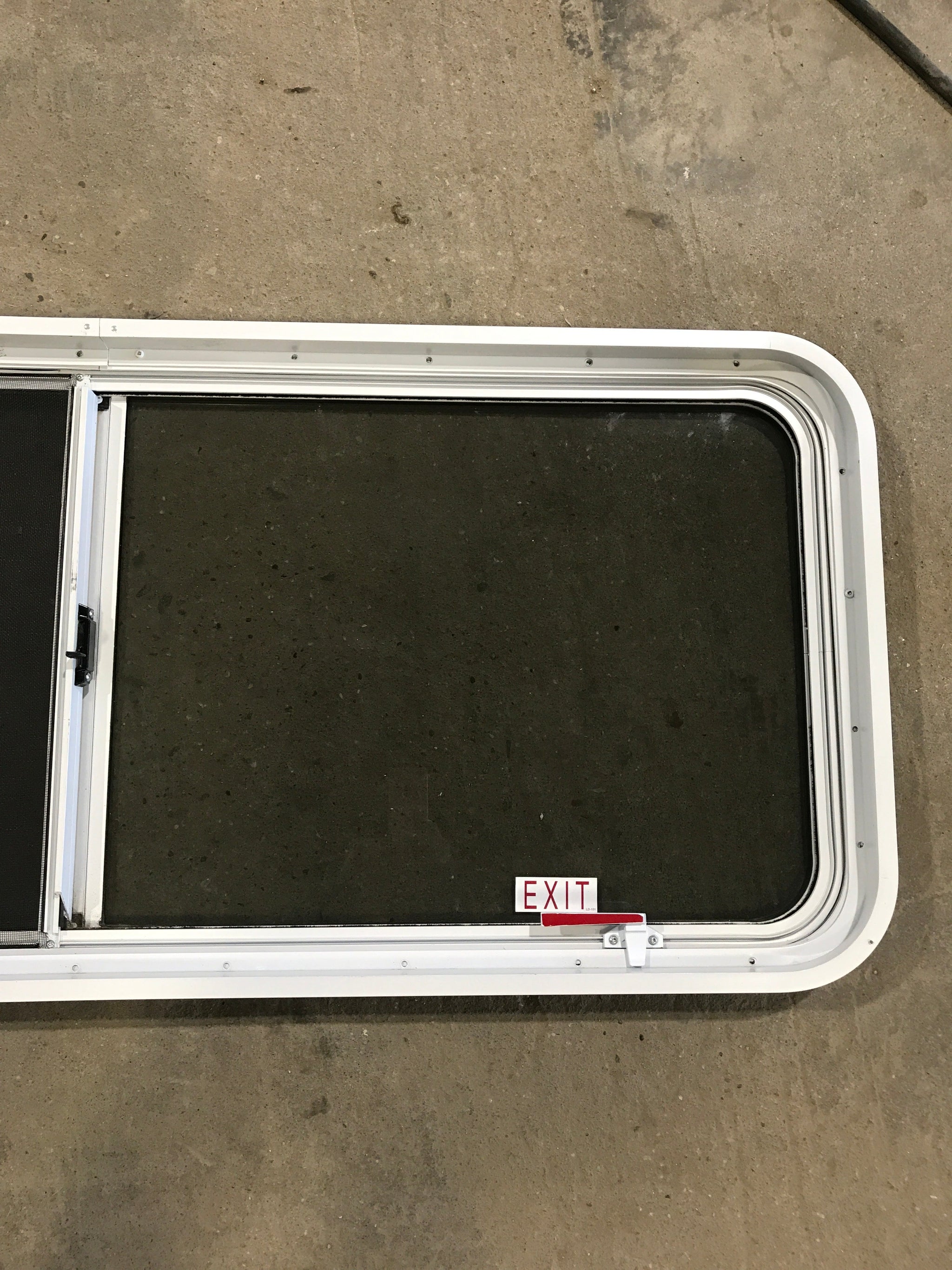 Used White Radius Emergency Opening Window : 54 1/4 W x 21 3/4 H x 2 D