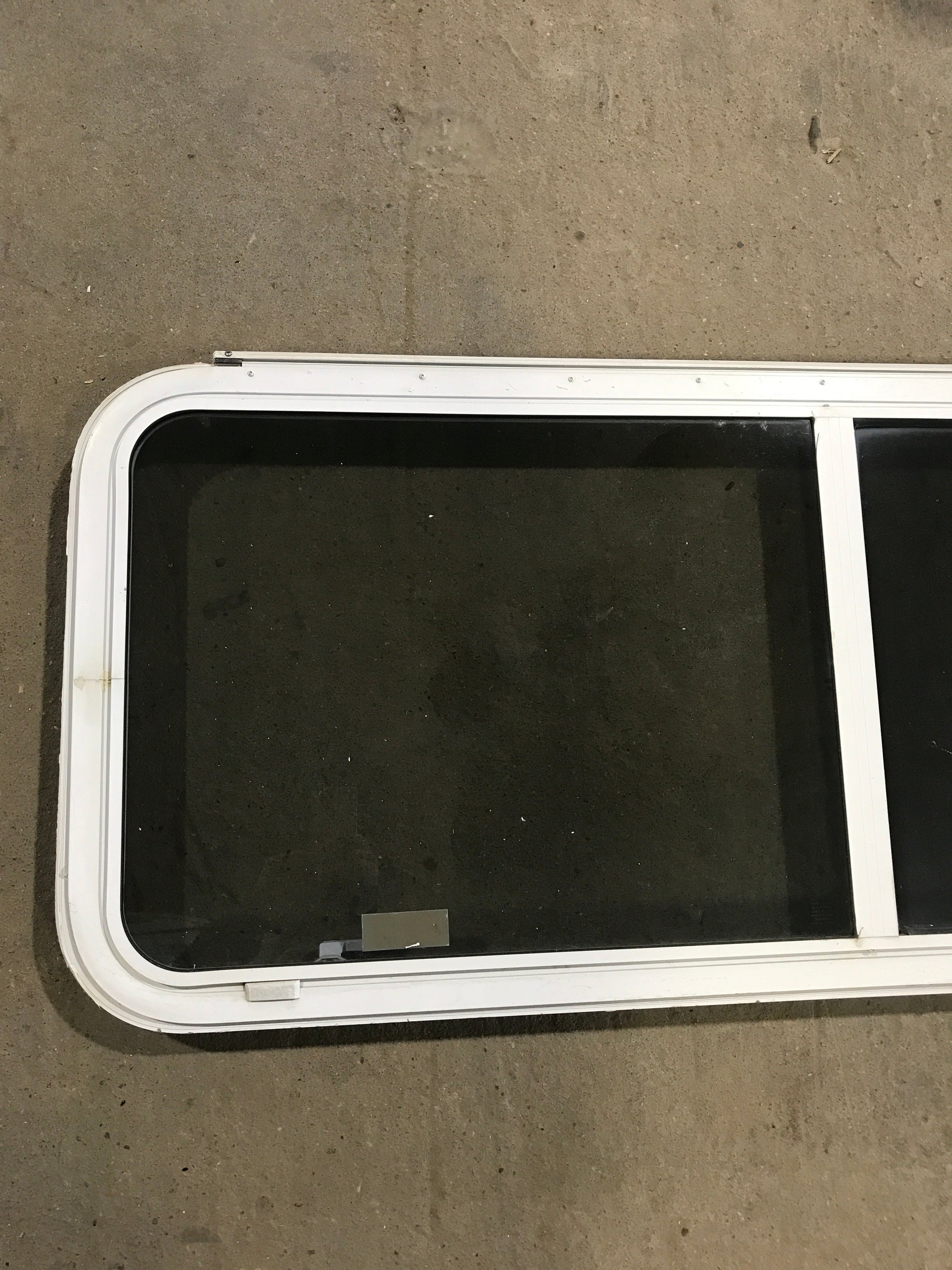 Used White Radius Emergency Opening Window : 54 1/4 W x 21 3/4 H x 2 D