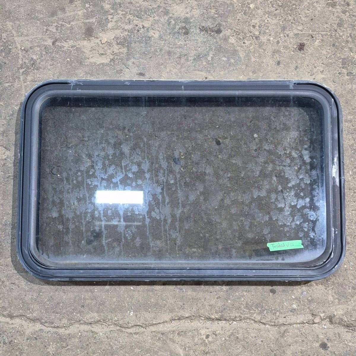 Used Black Radius Emergency Opening Window - 35 1/8 X 21 1/4 X 1 7/8