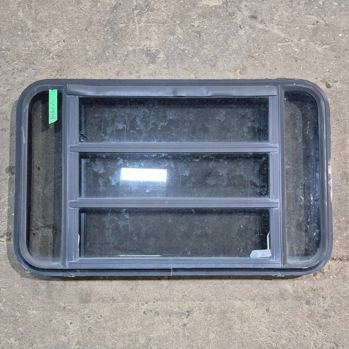 Used Black Radius Opening Window - 35 1/8 X 21 1/4 X 1 7/8