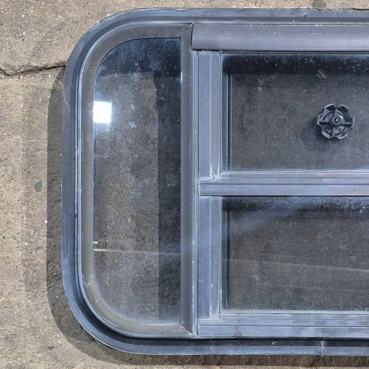 Used Black Radius Opening Window - 23 1/8 X 14 1/2 X 1 7/8