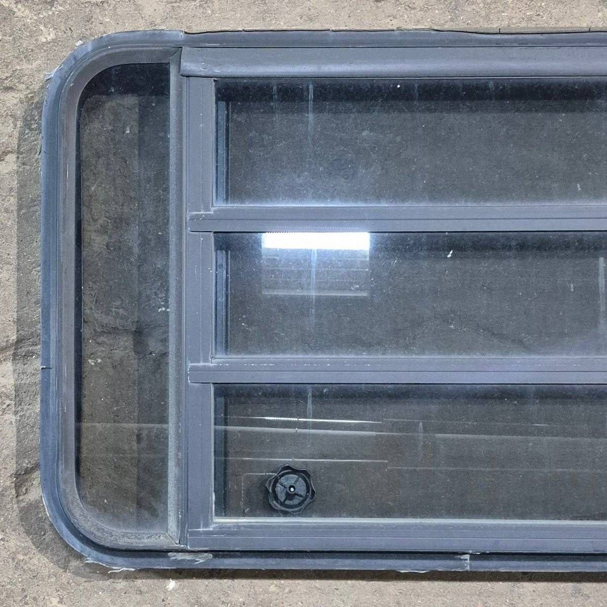 Used Black Radius Opening Window - 35 1/8 X 21 1/4 X 1 7/8