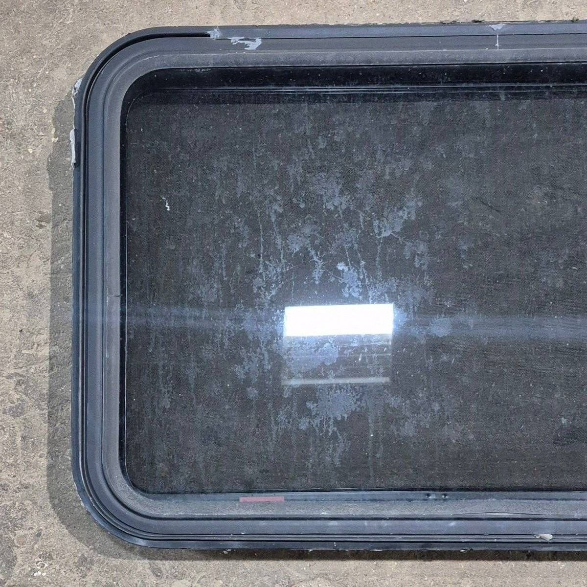 Used Black Radius Emergency Opening Window - 35 1/8 X 21 1/4 X 1 7/8