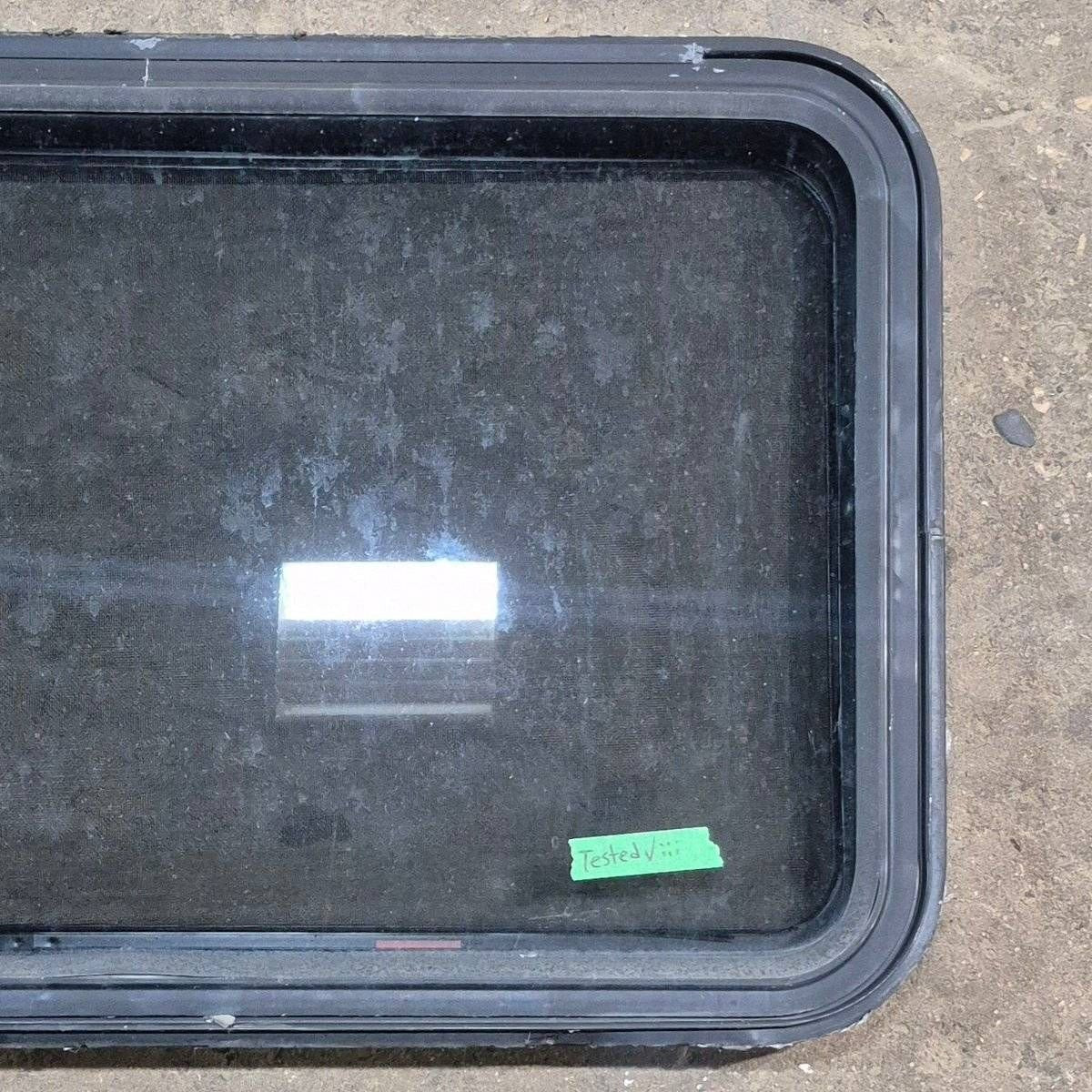 Used Black Radius Emergency Opening Window - 35 1/8 X 21 1/4 X 1 7/8