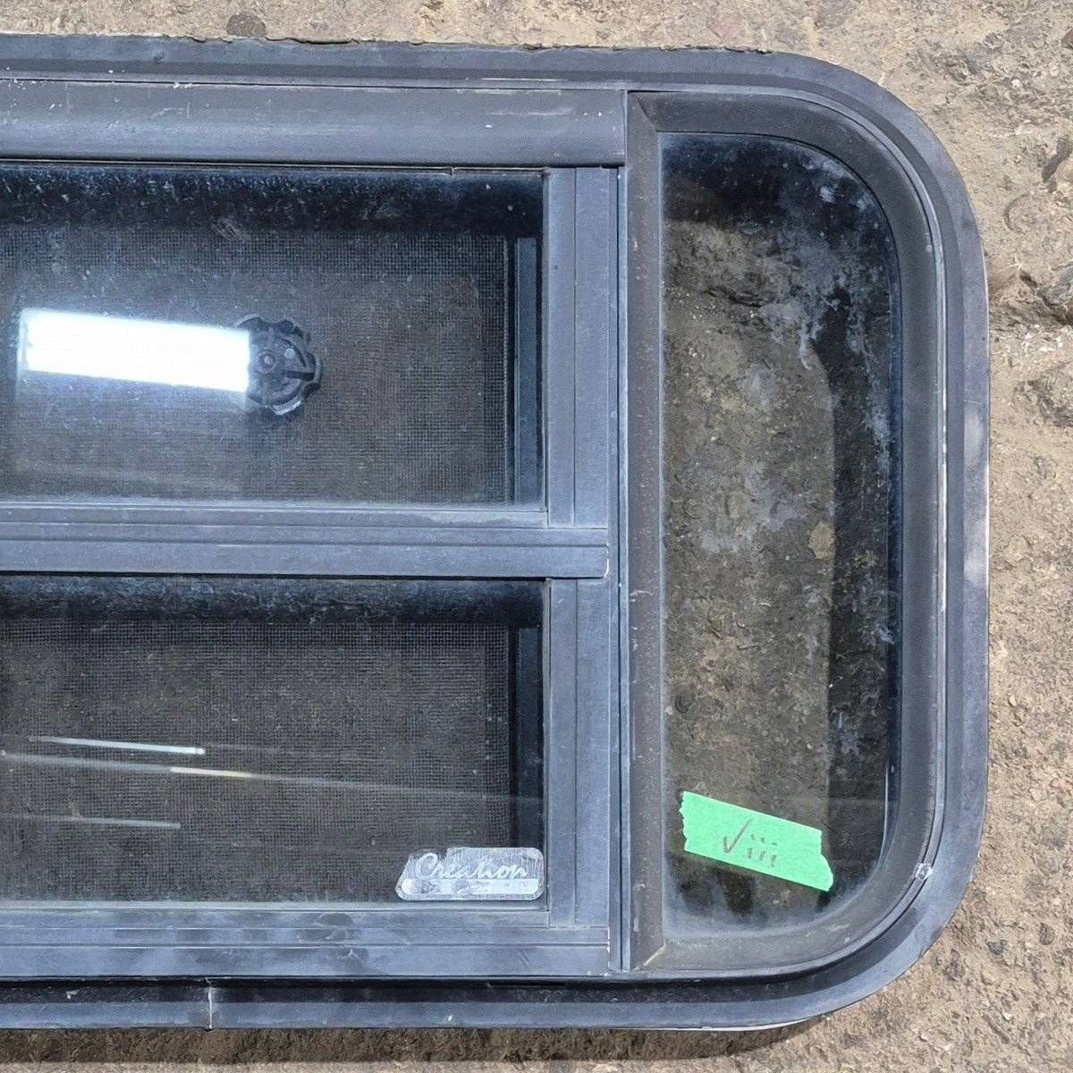 Used Black Radius Opening Window - 23 1/8 X 14 1/2 X 1 7/8