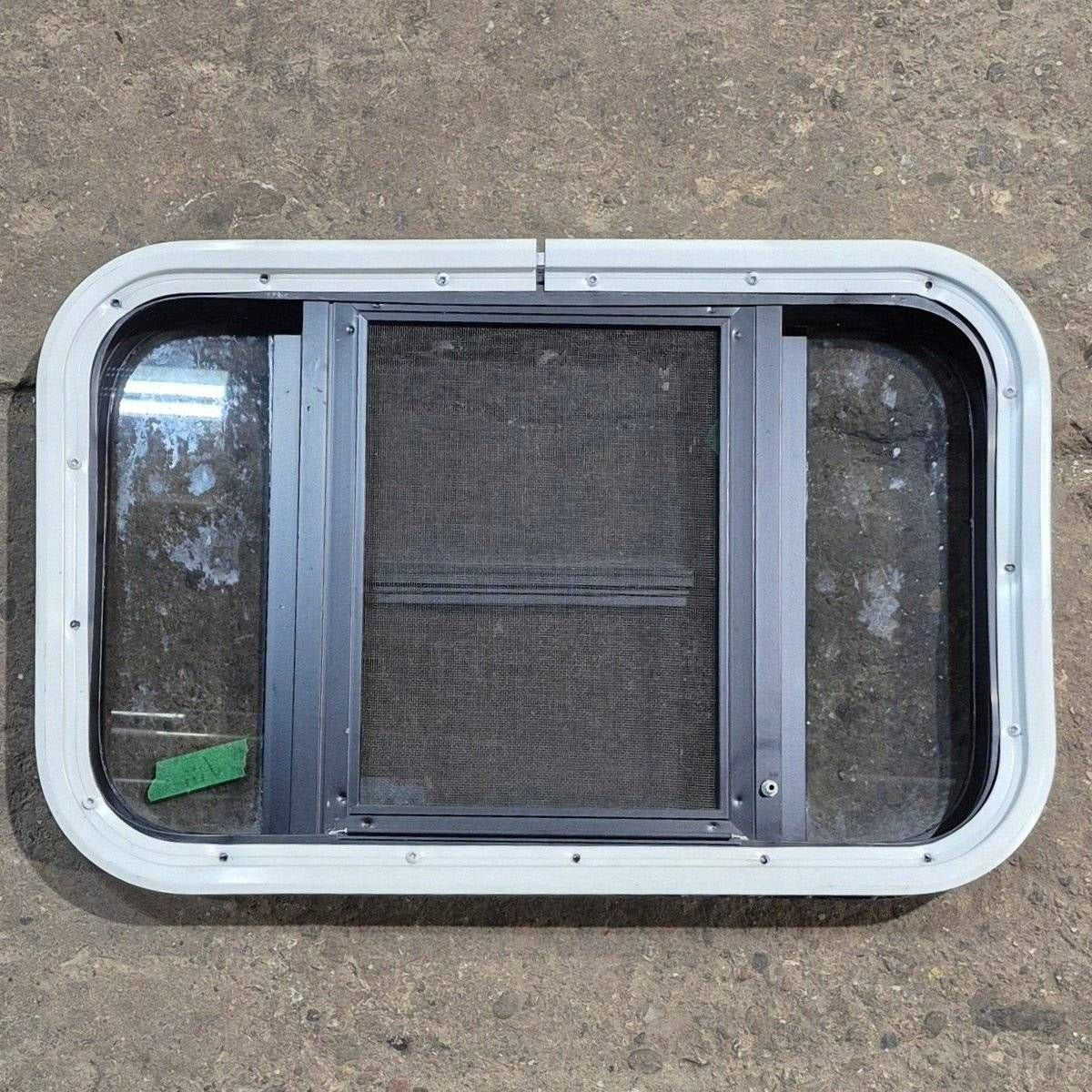 Used Black Radius Opening Window - 23 1/8 X 14 1/2 X 1 7/8