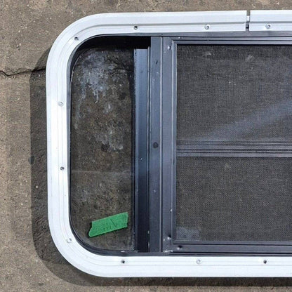 Used Black Radius Opening Window - 23 1/8 X 14 1/2 X 1 7/8