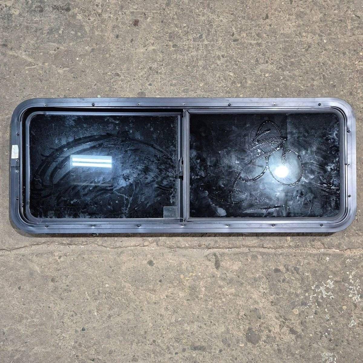 Used Black Radius Opening Window - 47 1/2 X 17 1/2 X 1 7/8
