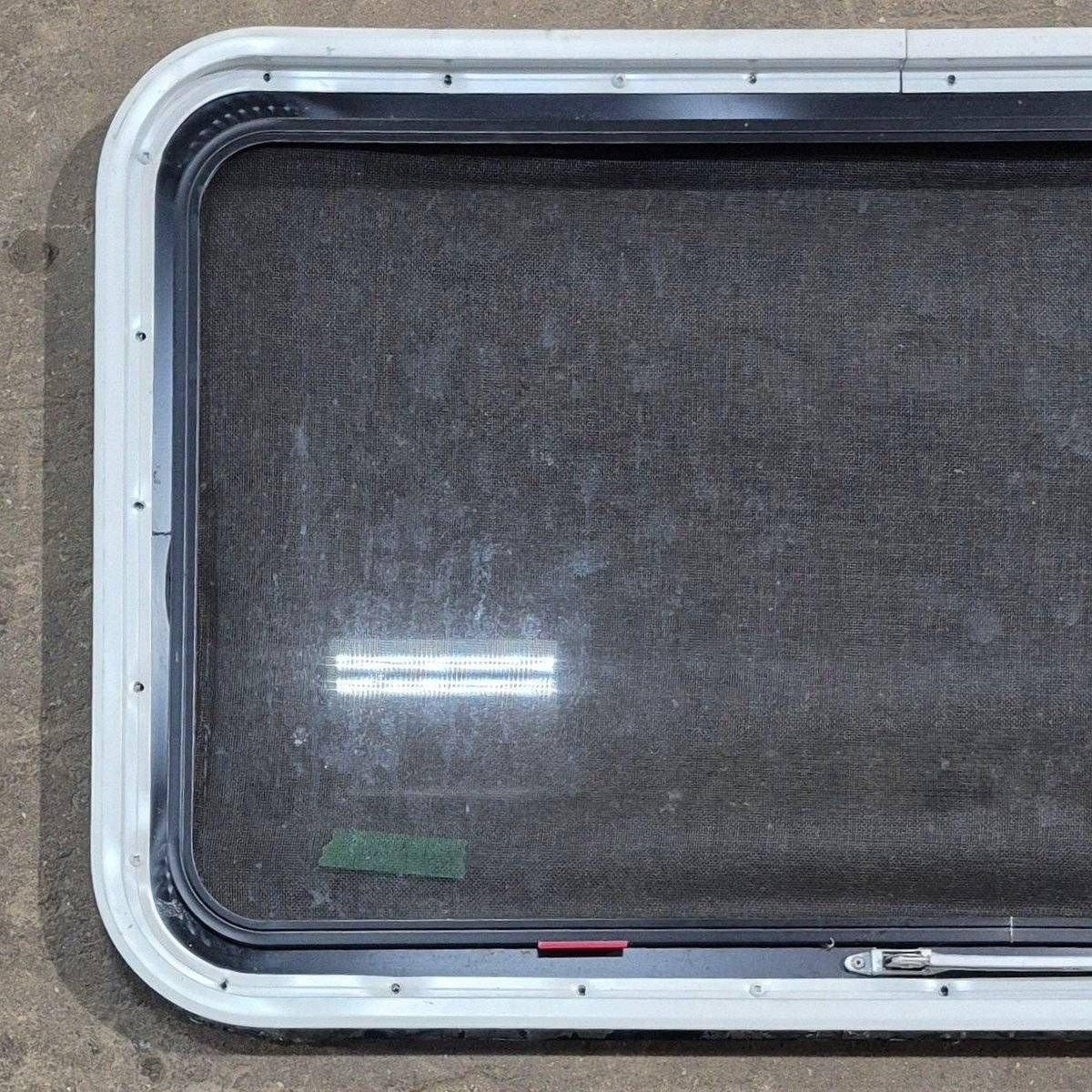 Used Black Radius Emergency Opening Window - 35 1/8 X 21 1/4 X 1 7/8