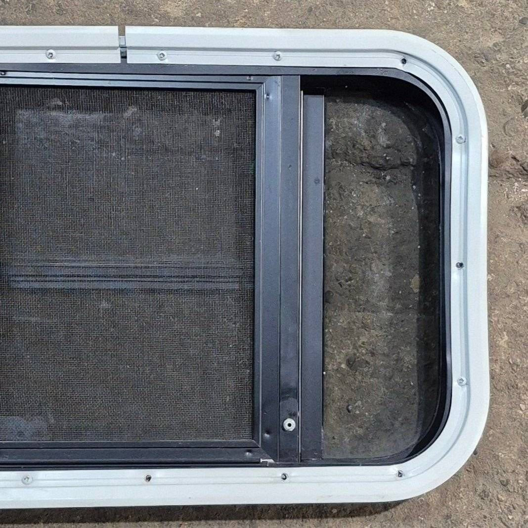 Used Black Radius Opening Window - 23 1/8 X 14 1/2 X 1 7/8