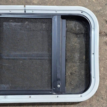 Used Black Radius Opening Window - 23 1/8 X 14 1/2 X 1 7/8