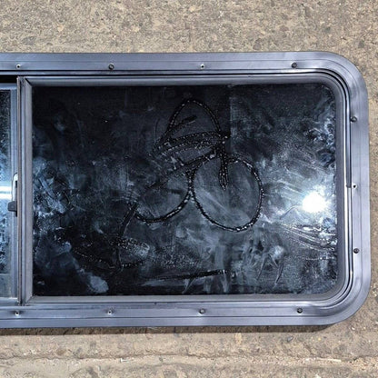 Used Black Radius Opening Window - 47 1/2 X 17 1/2 X 1 7/8