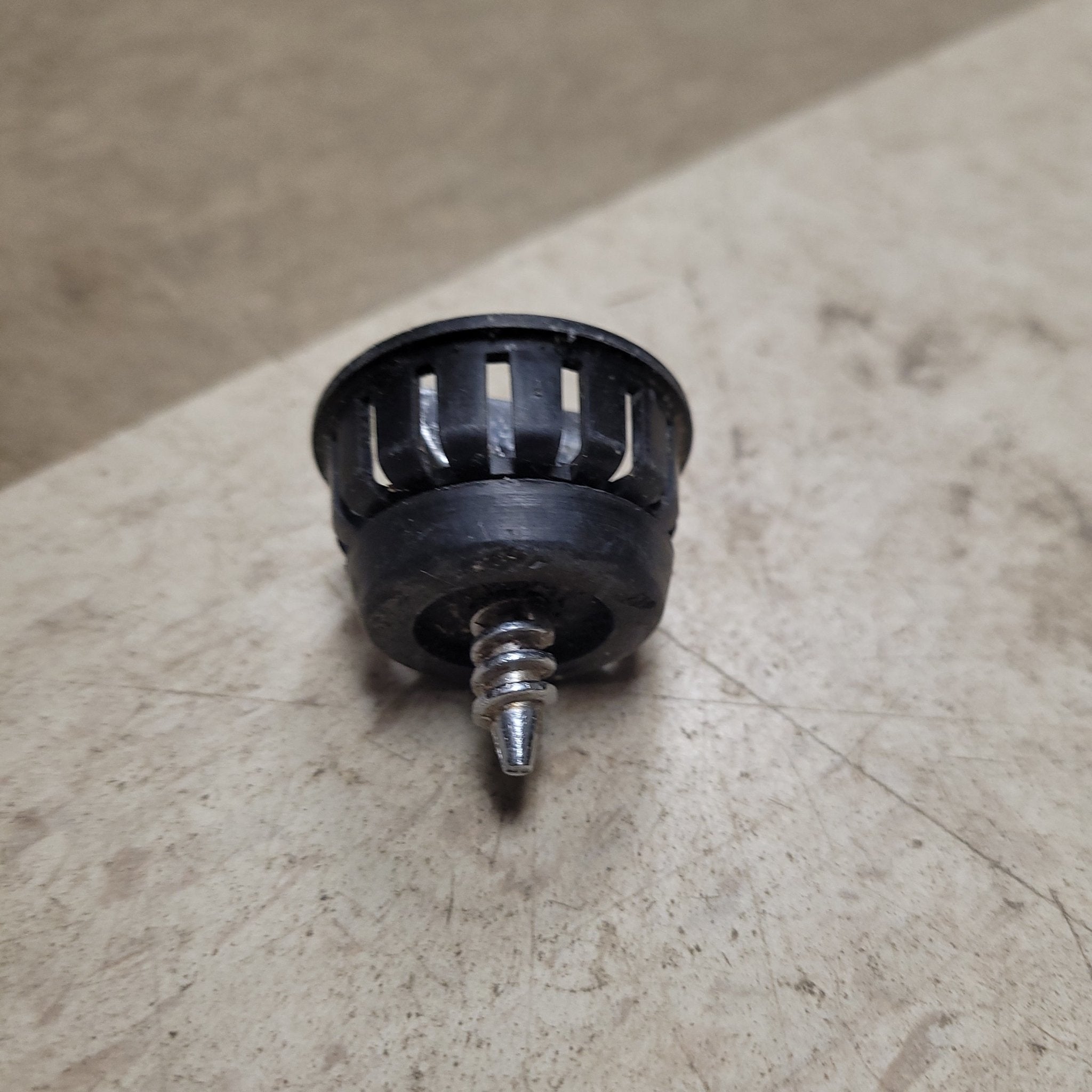 Used Twist Lock Strainer Plug for 2 Drain hole