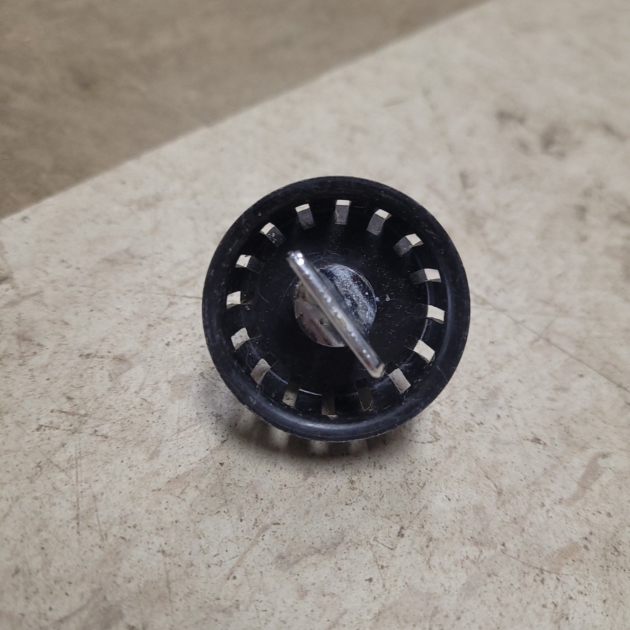 Used Twist Lock Strainer Plug for 2 Drain hole