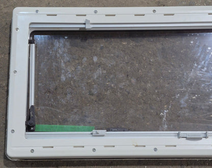 Used White Radius Emergency Opening Window : 46 5/8 W x 18 3/4 H x 1 1/8 D