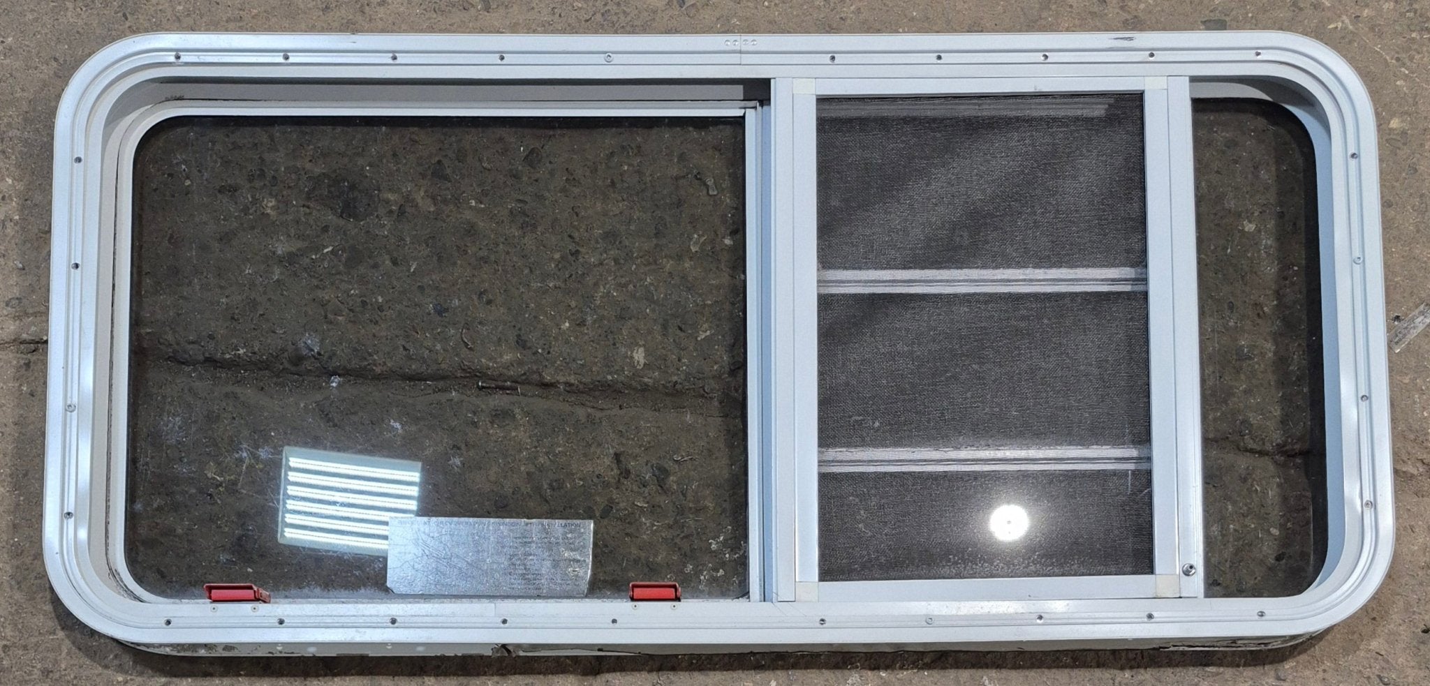 Used White Radius Emergency Opening Window : 47 1/4 W x 21 1/4 H x 1 7/8 D