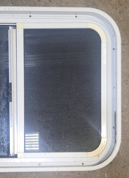 Used White Radius Opening Window : 23 1/2 W x 17 1/2 H x 2 D